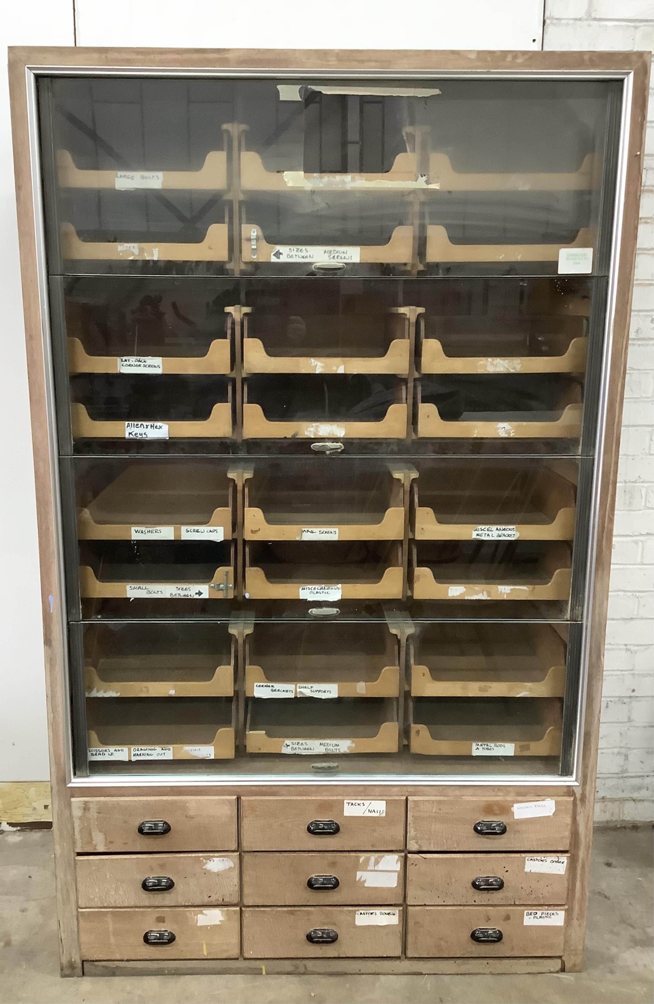 A mid century oak haberdashery cabinet, width 118cm, depth 53cm, height 194cm